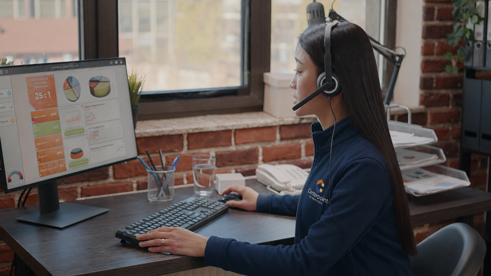 Centerpoint virtual assistant working at a desk supporting a client business